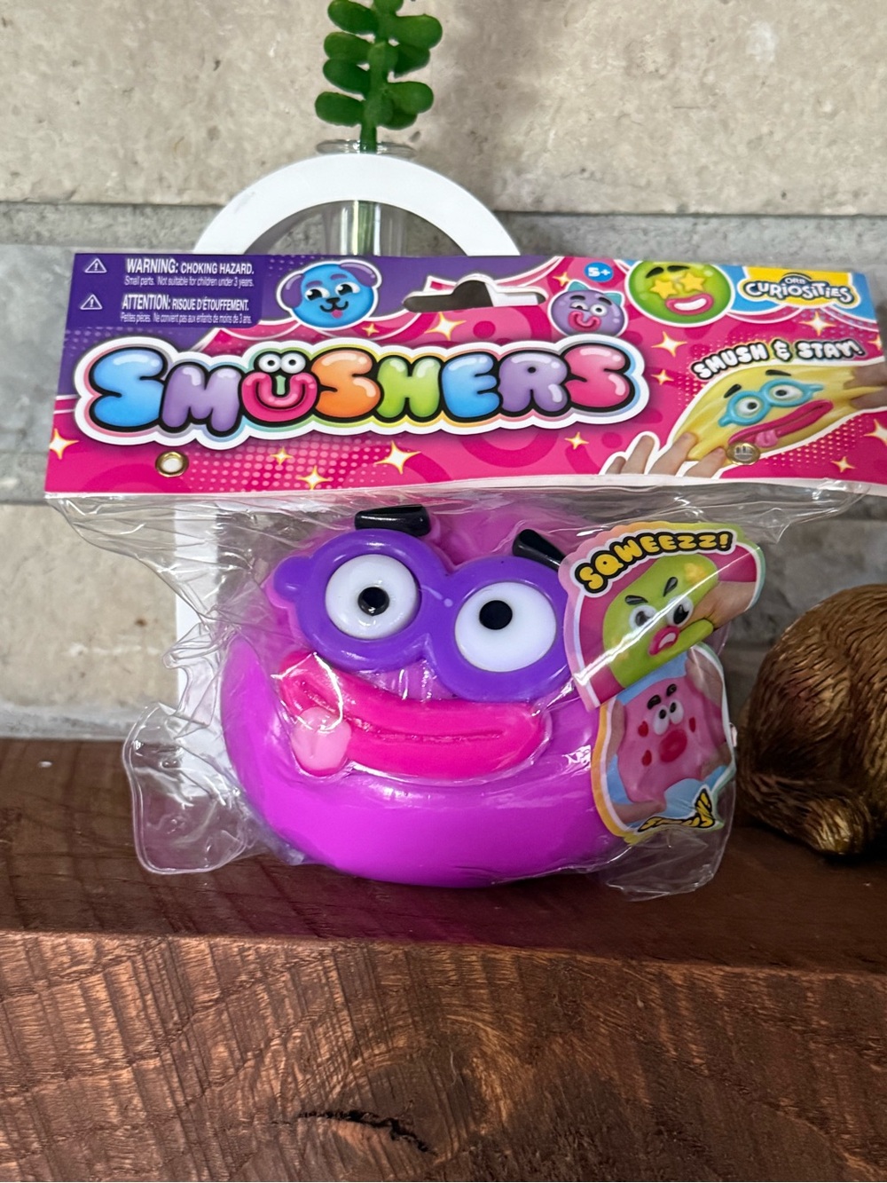 ORB Smusher Bright Pink Smiling Squishy Toy with Purple Eyes